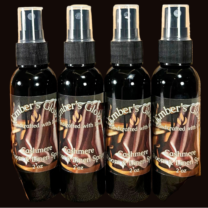 Black spray bottle with Cashmere scent, featuring soft musk, amber, and delicate florals, perfect for refreshing rooms and linens with a warm, elegant fragrance.