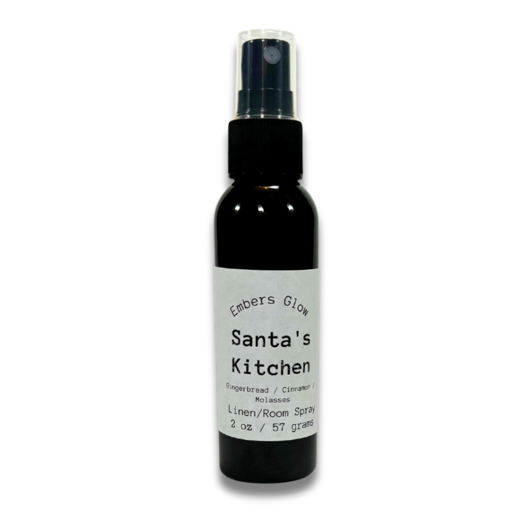 2 oz Winter Room & Linen Spray in Santa's Kitchen scent, featuring a festive blend of baked cookies, warm spices, and holiday sweetness. Long-lasting and eco-friendly, perfect for seasonal freshness.