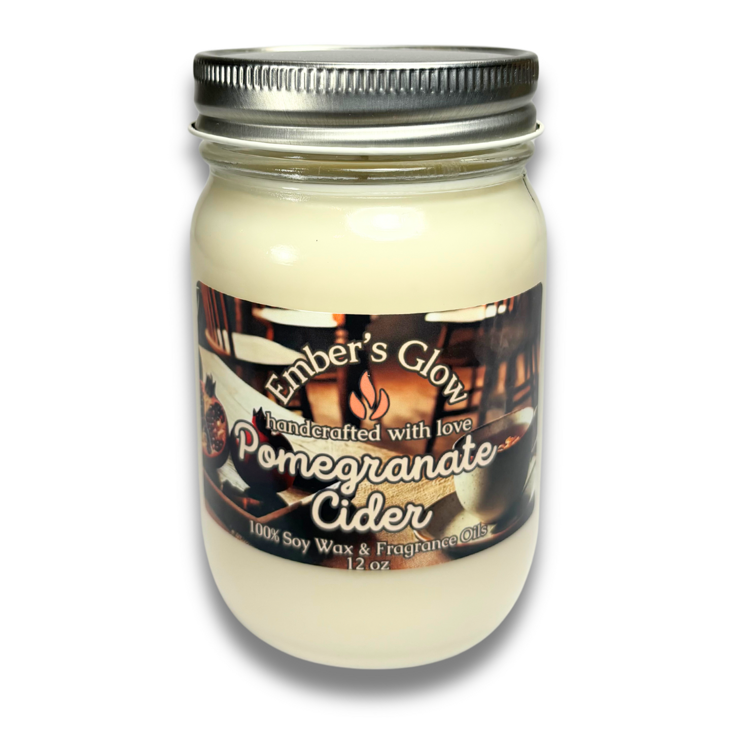 12 oz Pomegranate Cider soy candle in a glass jar, hand-poured with natural soy wax, featuring a fruity, spiced holiday scent.