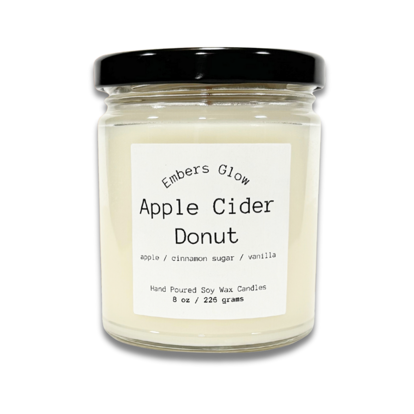 Glass jar candle with Apple Cider Donut scent, featuring the warm and sweet fragrance of donuts and spiced apple cider, ideal for creating a cozy fall atmosphere.