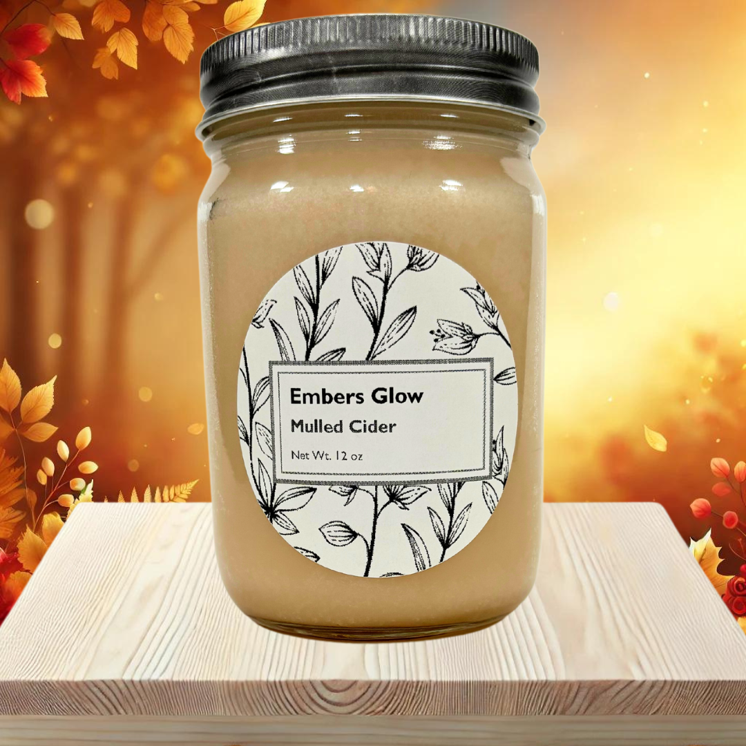 Glass jar candle with Mulled Cider scent, featuring spiced apples, cinnamon, and cloves, ideal for creating a warm and festive fall or winter atmosphere.