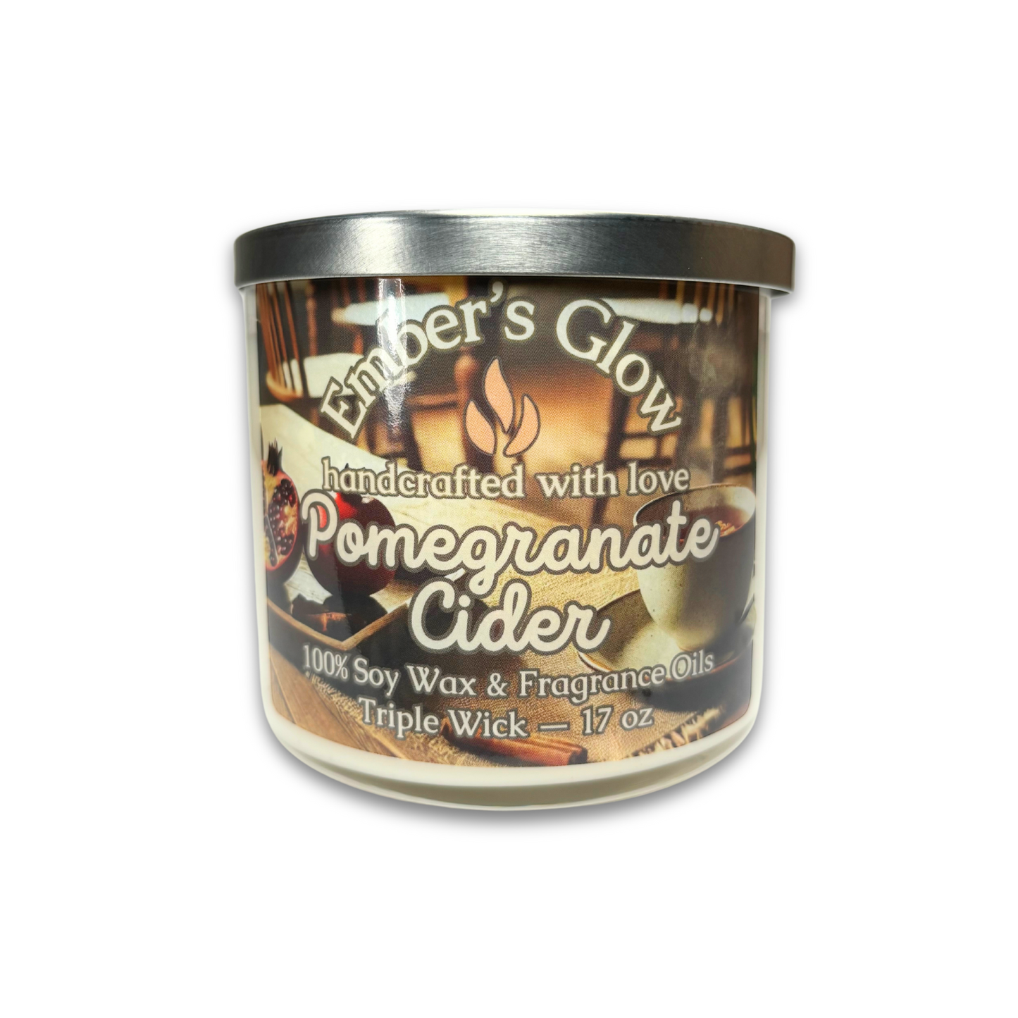 Hand-poured 17 oz three-wick soy wax candle in the Pomegranate Cider scent, combining tart pomegranate, spiced apple, and a hint of cinnamon for a festive and fruity winter fragrance.